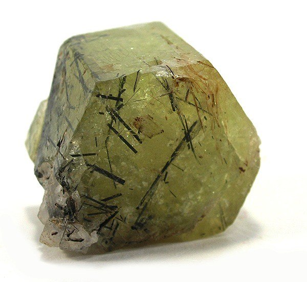 Dark inclusions of aegerine in light-green apatite