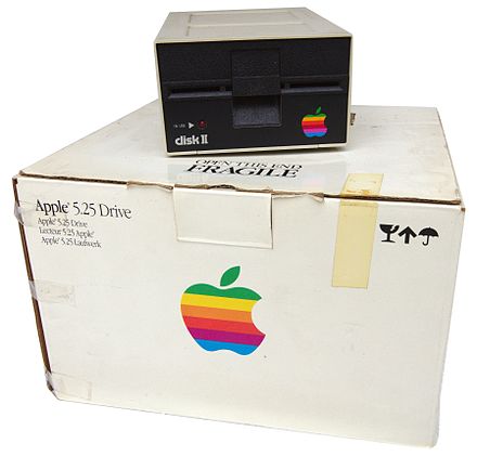 Disk II atop an original box for the Apple 5.25 Drive