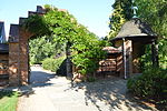 Archway at southern End of Laundry Court, leading to rear of Kitchen Gardens, and Garden House attached to south