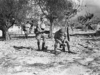 2/3rd Machine Gun Battalion personnel set up a Vickers machine gun during an exercise in Syria, October 1941 Australian 2-3rd MG Bn in Syra (AWM image 021169).jpg