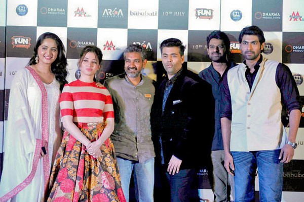 From left to right, Anushka Shetty, Tamannaah Bhatia, Rajamouli, Karan Johar, Prabhas, Rana Daggubati at the trailer launch of the Hindi version of Ba
