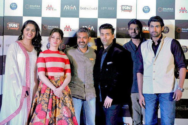 From left to right, Anushka Shetty, Tamannaah Bhatia, Rajamouli, Karan Johar, Prabhas, Rana Daggubati at the trailer launch of the Hindi version of Ba