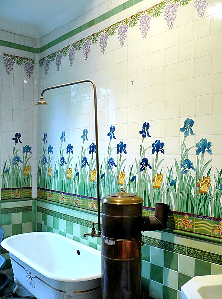 Bathroom in France, with a bathtub and a shower - and no toilet.