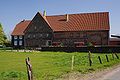 Farmhouse with farm buildings