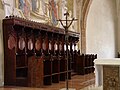 Il coro ligneo gotico con intarsi colorati del 1488