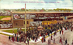 Postcard showing crowd outside of Borchert Field