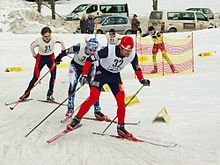 Des athlètes pendant l'épreuve de ski de fond