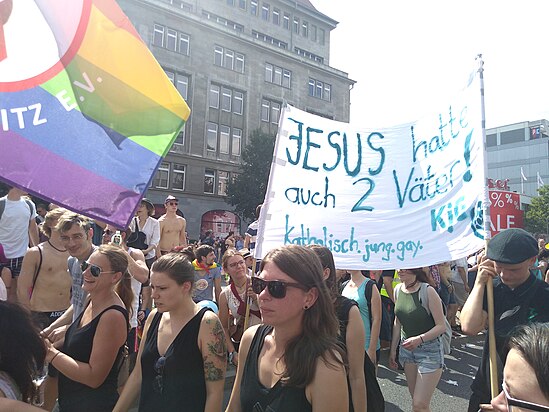 Banner reading "Jesus had two fathers as well" Image: Jasmin Sasika. (CC BY-SA 4.0)