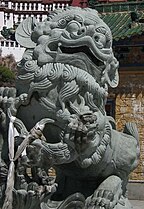 Chinese stone Lions protect the entrance to the Potala