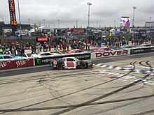 Bell doing burnouts after winning the Xfinity race at Dover in October 2018 Christopher Bell after winning 2018 Bar Harbor 200.jpeg