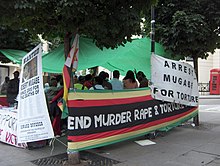 A demonstration in London against Robert Mugabe. Protests are discouraged by Zimbabwean police in Zimbabwe. Demonstration against Mugabe.JPG