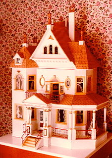 Dollhouse miniature house, possibly for dolls that fit the house according to scale