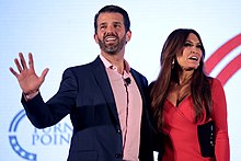 Trump Jr. with Kimberly Guilfoyle in July 2019 Donald Trump, Jr. & Kimberly Guilfoyle (48513772081).jpg