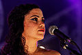 * Nomination Emel Mathlouthi en concert sur la scène cabaret lors du festival du bout du Monde à Crozon dans le Finistère (France). --Thesupermat 14:55, 18 February 2013 (UTC) * Promotion Good quality with regard to the light conditions. --Tuxyso 18:36, 18 February 2013 (UTC)  Comment Just as a suggestion, I think it'd be even better if it was a bit more lightful (especially the upper part of the face, the background is perfect). --Kadellar 18:56, 18 February 2013 (UTC)