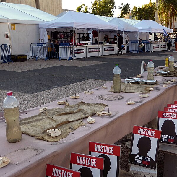 File:Empty Shabbat table installation in Hostages and Missing Square, March 2024 30.jpg