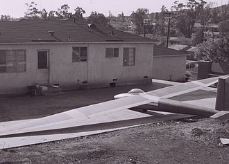 First full assembly of the GT-1 in the backyard of the house in La Mesa, California, where it was built in the garage over several years in the late 1950s. The GT-1 has the early bubble canopy in this photo. GT-1 backyard.jpg