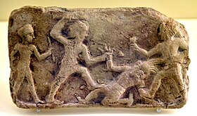 Gilgamus et Enkidu daemonem Humbabum necant; imago e terra cocta ficta, saeculo fere 18 a.C.n.
