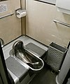 Squat toilet aboard a Japanese Ginga train