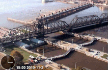 Government Bridge across the Mississippi has a swing section for river traffic traversing Lock and Dam 15 Govt bridge anim2.gif