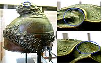 Greek helmet with swastika marks on the top part (circled), 350–325 BCE from Taranto, found at Herculanum. Cabinet des Médailles, Paris.