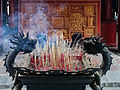 Burning incense sticks, Temple of Literature, Hanoi, Vietnam