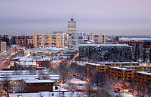 The Swedish suburbs of Husby, Kista, and Akalla are built according to the typical city planning of the Million Programme Husby Kista.jpg