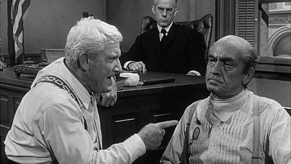 Harry Morgan as the judge, Spencer Tracy as Drummond and Fredric March as Brady