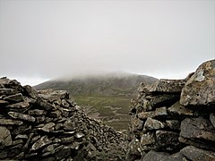 Inside the Celtic Iron Age hillfort of Tre'r Ceiri, Gwynedd Wales, with its 150 houses; finest in Europe 59.jpg