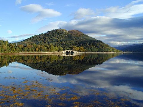 Aray Bridge on Loch Fyne from Inveraray. The spires of Inveraray Castle can just be seen on the left. The hill behind the bridge is Dun Corr Bhile