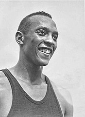 Jesse Owens, American track and field athlete and four-time gold medalist in the 1936 Olympic Games