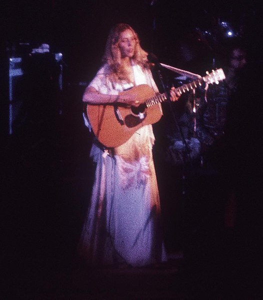 Mitchell performing at the Anaheim Convention Center in 1974