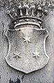 English: Relief of coats of arms on the gravestone of the noble families von Gnagnoni and von Sterneck Deutsch: Wappenrelief am Grabstein der Adelsfamilien von Gnagnoni und von Sterneck