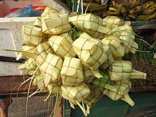 In Indonesian markets, empty pouch of ketupat skin made from woven janur are often sold prior to Lebaran. Kulit ketupat.JPG