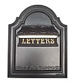 A British cast iron letter box designed and sold by Lumley Designs.