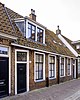 Dubbel woonhuis in ambachtelijk-traditionele stijl