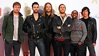 "Payphone" by Maroon 5 (pictured) featuring Wiz Khalifa spent eight weeks at number one, becoming the longest-running number-one single of the year. Maroon 5, 2011.jpg