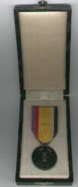 Médaille dans un étui