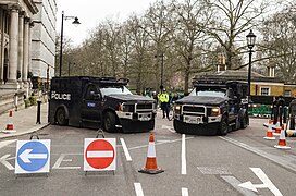 Metropolitan Police Jankel Guardians engaged on an operation. These are utilised by public order and armed officers for high-profile operations and airport patrols.