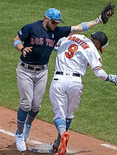 Michael Chavis (left) hit his first MLB grand slam on July 15. Michael Chavis, Keon Broxton (48076090396) (cropped).jpg