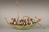 Model de barcă; 1981–1975 î.Hr.; lemn vopsit, ipsos, sfoară de in și țesătură de in; lungime: 145 cm; Muzeul Metropolitan de Artă