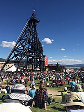A crowd gathers for the Montana Folk Festival in 2015. The Original headframe is converted into a stage during the annual festival.