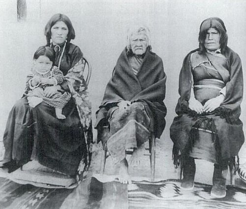 Nampeyo, of the Hopi-Tewa People, in 1901; with her mother, White Corn; her eldest daughter, Annie Healing holding her granddaughter, Rachel