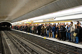 A crowded Paris Metro mean station platform in 2007 November 2007 Strikes France Crowded Platform.jpg