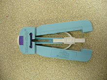 An optical fiber stripper Optical fiber stripper pg eti 2007.jpg