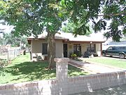 The Sullivan House was built in 1936 and is located at 8254 W. Madison St.. It was owned by Mr. Sullivan, an agent for the Santa Fe Railway Company and manager of Western Union.