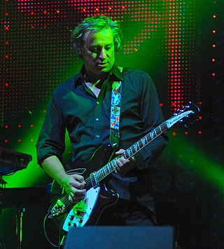 <span class="mw-page-title-main">Peter Buck</span> American guitarist for R.E.M., songwriter