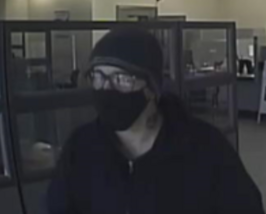 The Piggy Bank Bandit during a bank robbery on December 1, 2020 Piggy bank bandit.png