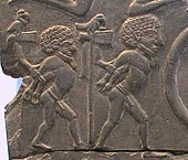 The prisoners on the Battlefield Palette may be the people of the Buto-Maadi culture subjected by the Egyptian rulers of Naqada III. Prisoners on the Battlefield Palette.jpg