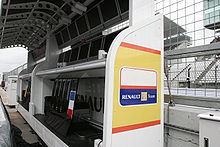 Renault F1 equipment on the pitwall at the 2009 Japanese Grand Prix with ING logos covered after the company ended their sponsorship. Renault after losing the title sponsor ING 2009 Japan.jpg