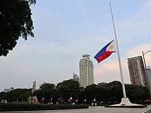 Philippine flag at half-staff at Rizal Park a few days after the death of former president Noynoy Aquino. Rizal Park, flag half-mast side (Manila; 06-26-2021).jpg